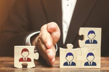 Companies investing significantly in voluntary retirement schemes amidst layoff discussions in corporate sector.
