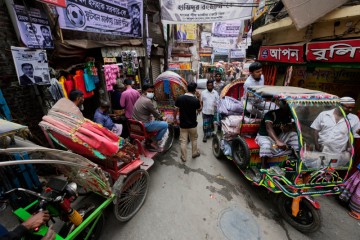 Bangladesh holds its inaugural election post-uprising, testing democratic principles and minority protections.