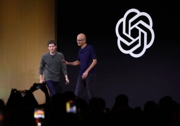 Satya Nadella recalls Bill Gates' skepticism about his investment in OpenAI during an interview.