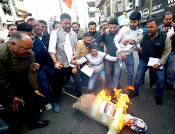 BJP Yuva Morcha demonstrates in Jammu, calling for Rahul's apology regarding AI Summit incident.