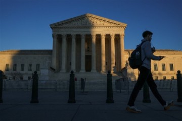 India postpones discussions on US trade amid Supreme Court ruling causing global market uncertainty.