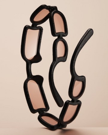 Issey Miyake Eyes Unveils UROKO Sunglasses Inspired by Renowned Ceramic Artist Shoji Kamoda.