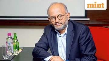 Shantanu Narayen steps down after 18 impactful years, receiving praise from schoolmate Satya Nadella.