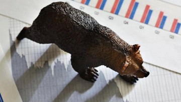 Nifty falls below 23,300 amid metal sector challenges and cautionary signals from options data.