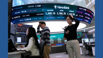 Asian shares skid as oil tops $111 a barrel and Wall Street slumps