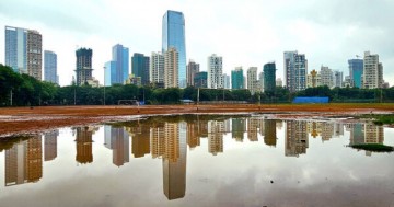 Goldman Sachs lowers Indian equities rating to 'market weight' due to rising energy prices.