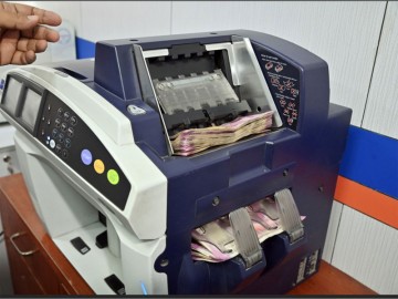 Regulatory measures could provide short-term relief, yet global pressures are likely to strain the rupee.