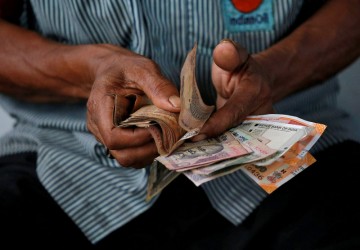 Rupee gains 10 paise to 92.41/USD amid global tension risks