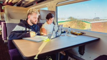 What passengers consume; on trains: videos, games, news, and podcasts on board