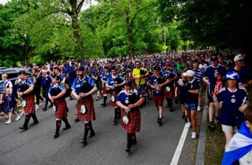 They're great, great people: Tartan Army takes over Boston as Scotland fans revel in World Cup return and drink bars dry