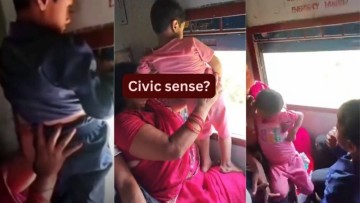 Mother holds child out of moving train window to urinate; video sparks debate on civic sense and child safety during travel