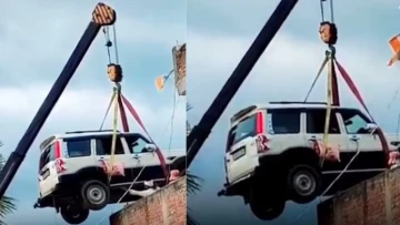 Fearing theft, Bihar man uses crane to park Mahindra Scorpio on rooftop
