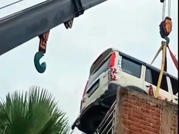 SUV parked on house roof goes viral -- carmaker's boss reacts