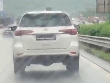 SUV driver had a button to hide number plate -- then video went viral