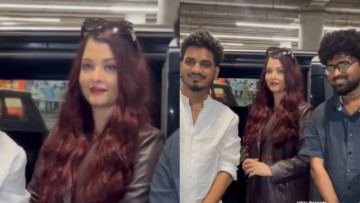 Aishwarya Rai returns to India after Paris Fashion Week; greets paparazzi, poses with fans