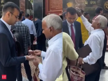 Father fixes son's coat, combs his hair & feeds him sweets before interview: viral UPPSC video