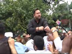 Tejashwi Yadav joins INDIA bloc protest against CEC Gyanesh Kumar