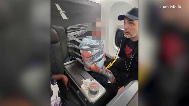 Disruptive passenger duct-taped to first-class seat as plane diverted to make emergency landing